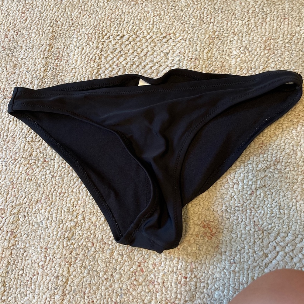 Xhileration swim bottoms. Gently used, does not fit me anymore. Size Medium